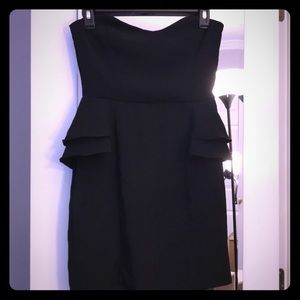 Black strapless mini dress with peplum detail